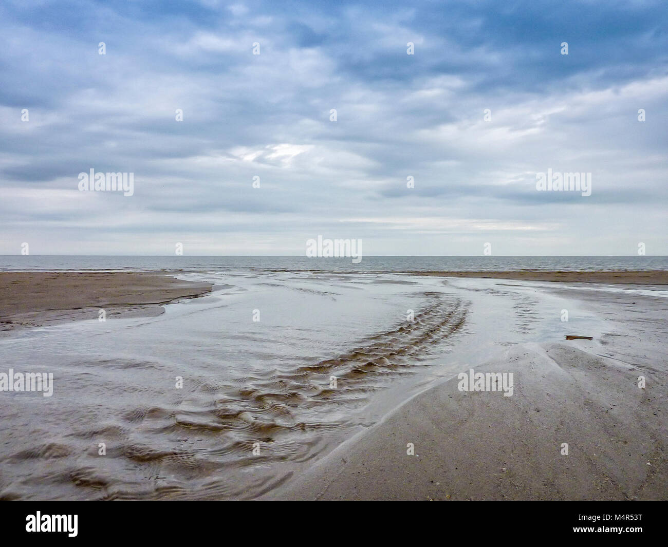 tracks through sand on beach at Mablethorpe, Lincolnshire Coast, England Stock Photo