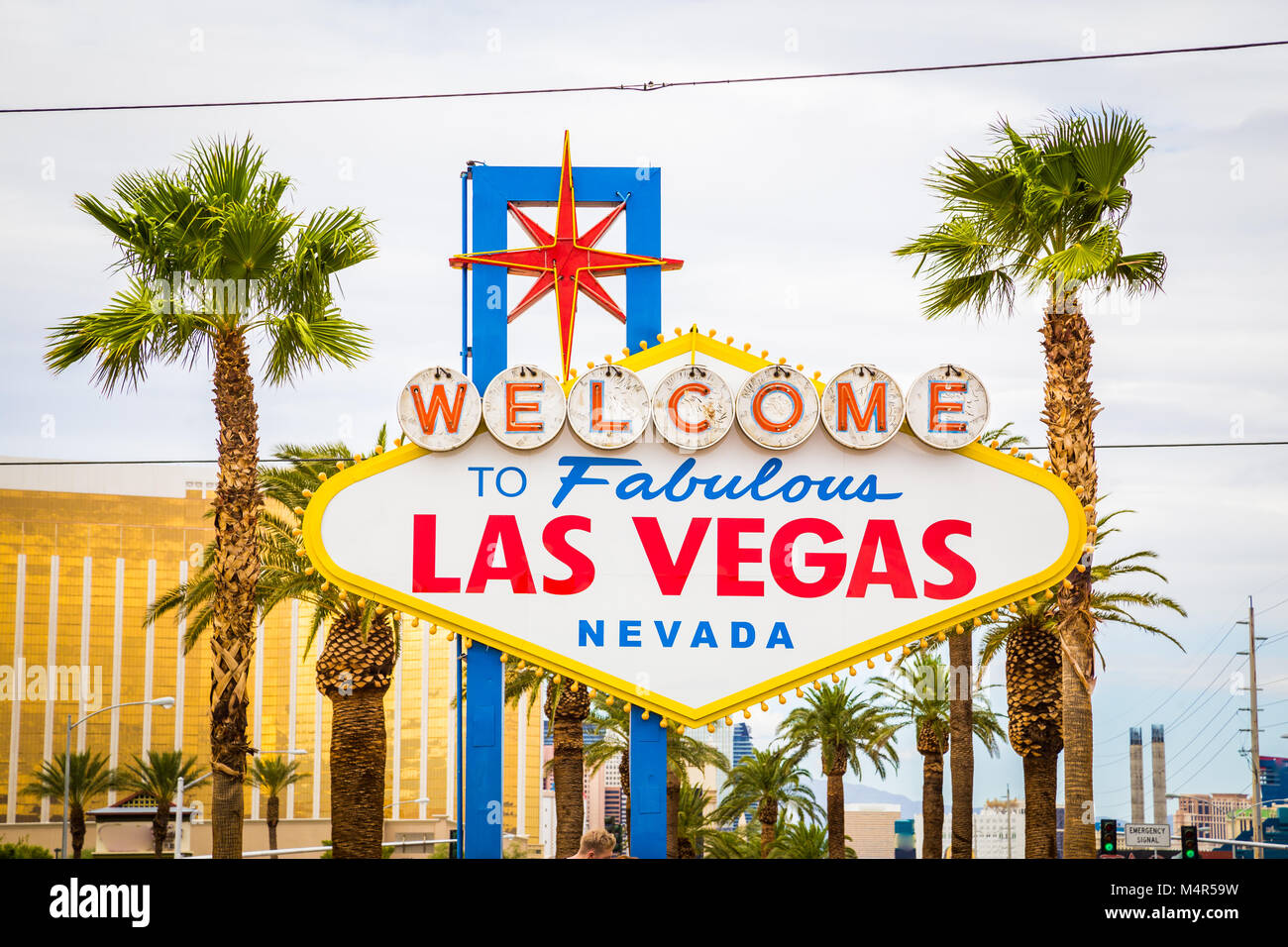 Classic view of Welcome to Fabulous Las Vegas sign at the south end of world famous Las Vegas strip on a beautiful sunny day with blue sky and clouds Stock Photo