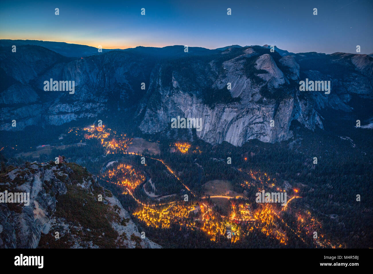 Panoramic aerial bird's eye view of famous Yosemite Valley illuminated
