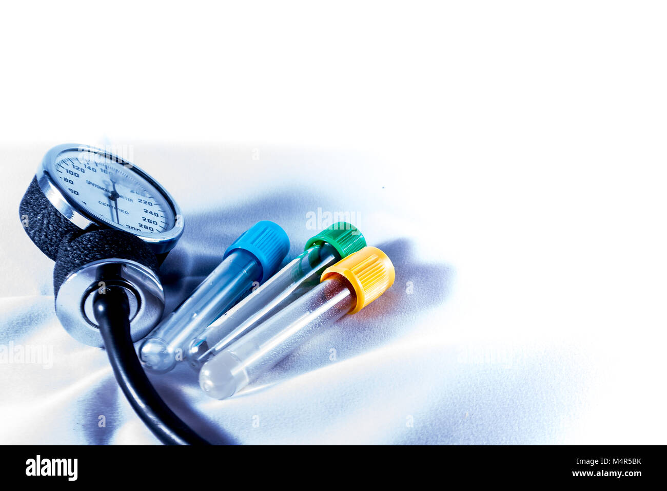 blood test bottles and sphygmomanometer Stock Photo Alamy