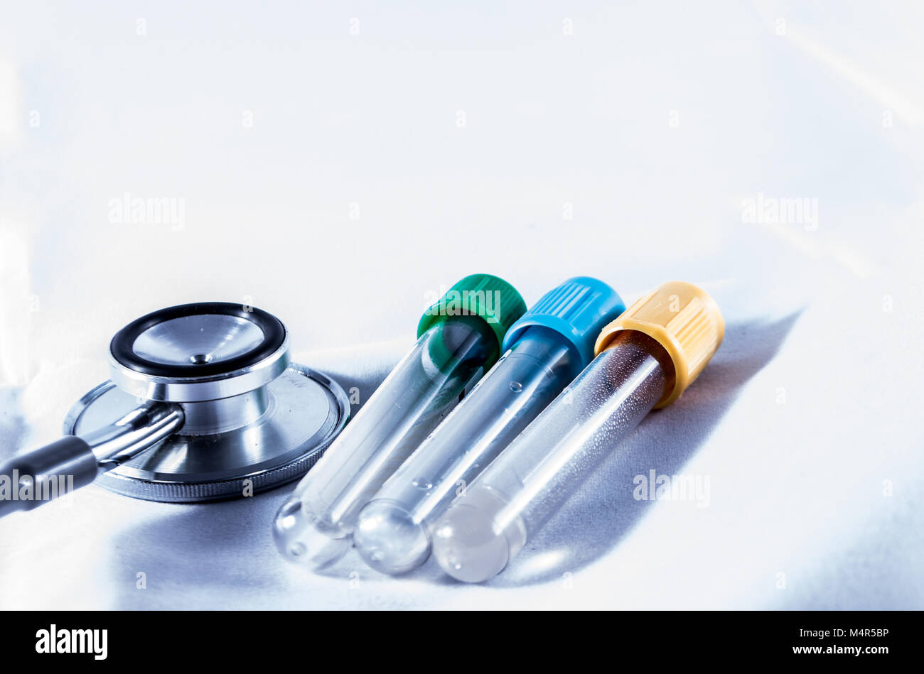 vials of blood tests and stethoscope Stock Photo Alamy