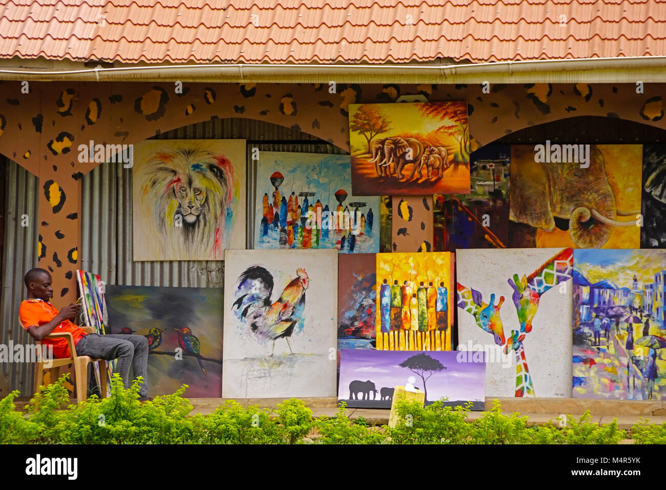 Paintings for sale at shop in the 3D Art & Cultural Village in Kampala. Stock Photo
