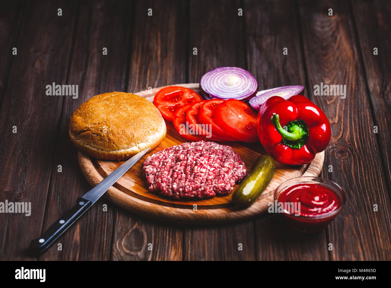 Raw Ground beef meat Burger steak cutlets with seasoning, cheese Stock