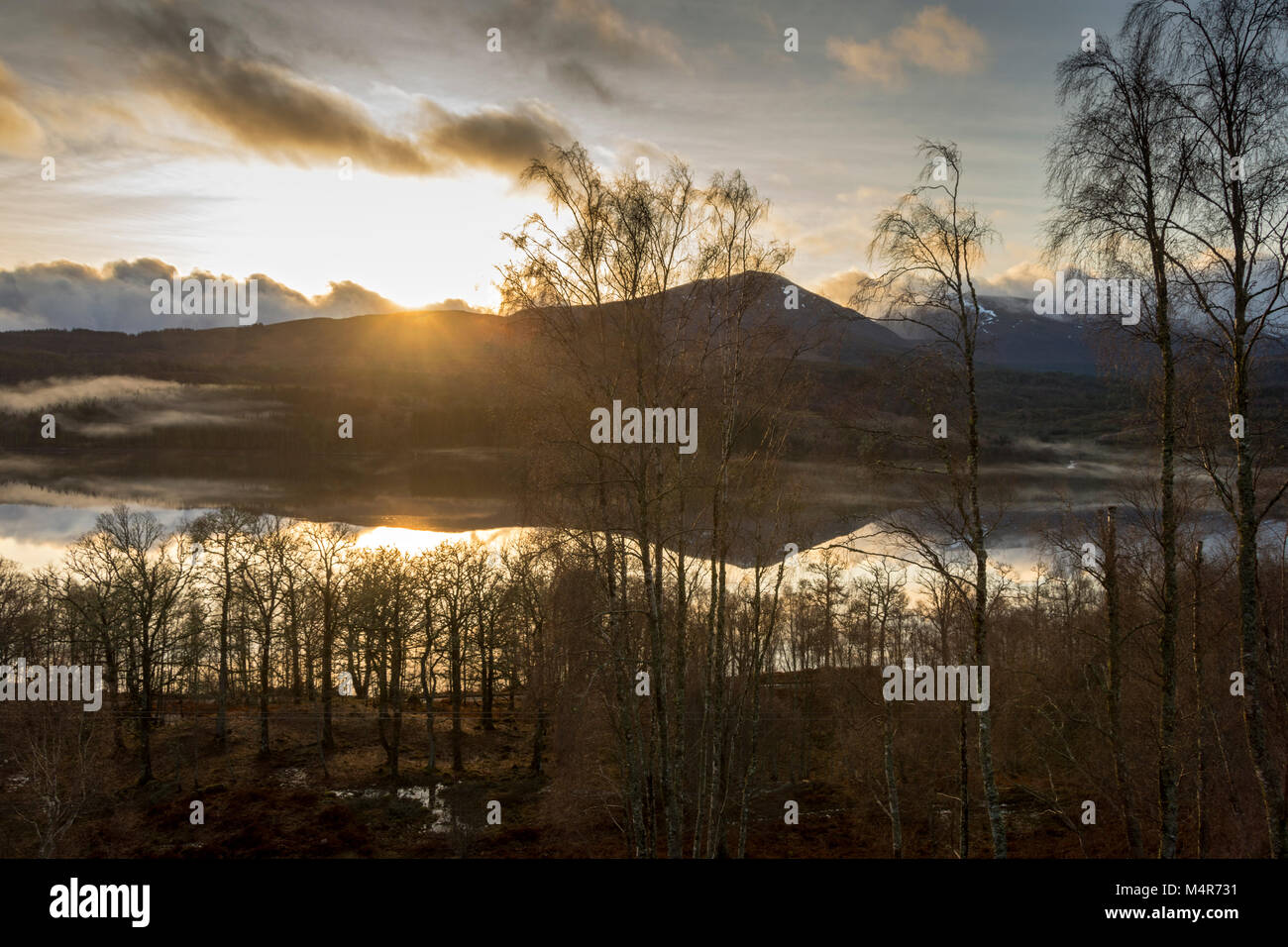 Ben Tee over Loch Garry at sunrise, Glen Garry, Highland region, Scotland, UK Stock Photo