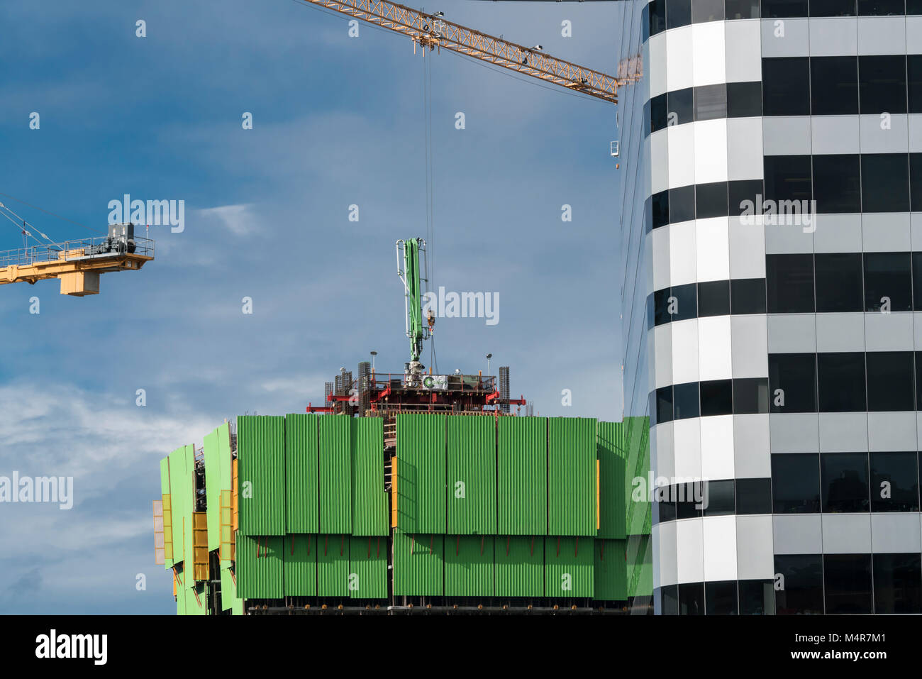 United States, Washington, Seattle, Construction of one building behind another building. Stock Photo