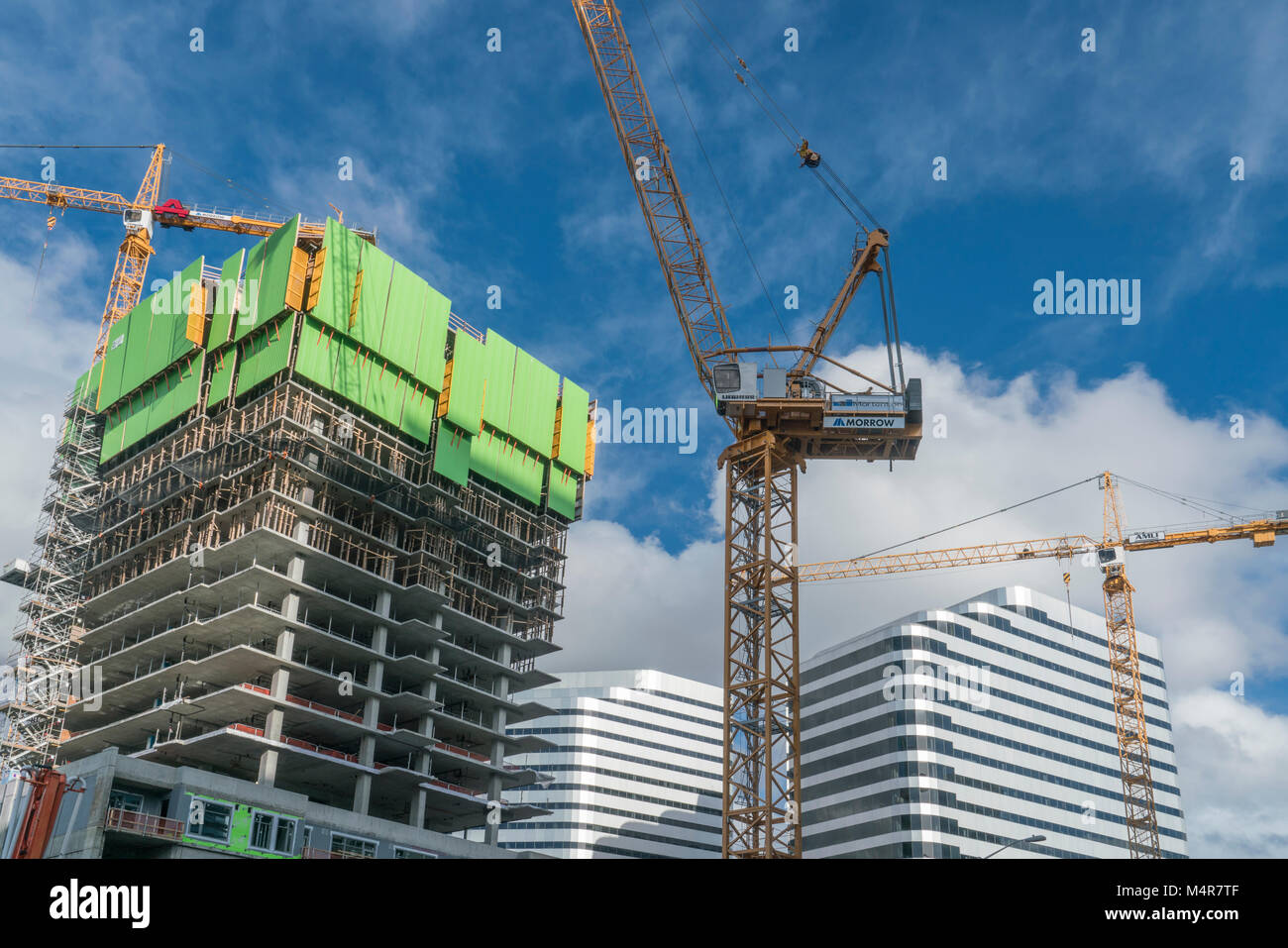 United States, Washington, Seattle, Construction of a building with cranes Stock Photo
