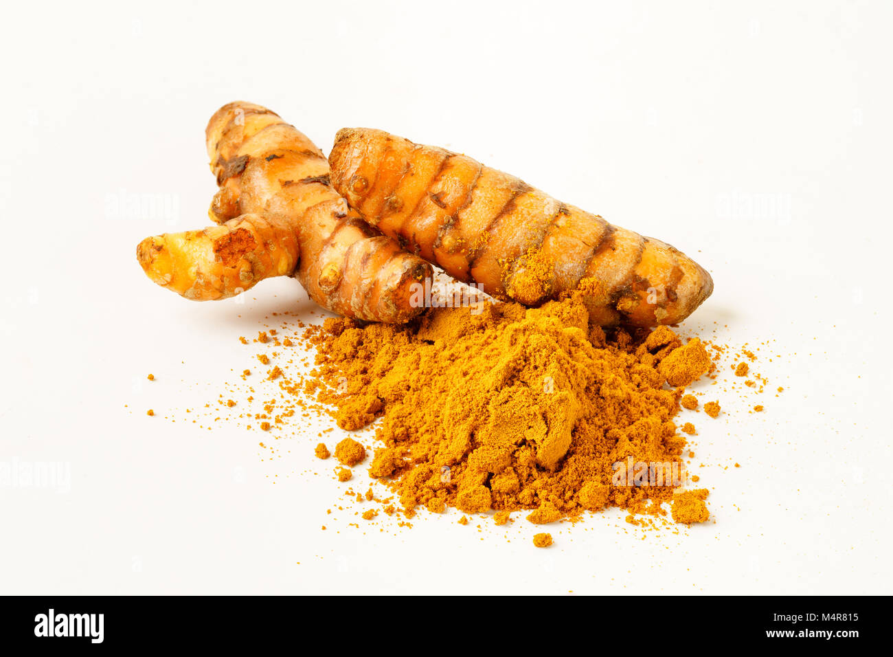 Turmeric whole and powder Stock Photo Alamy