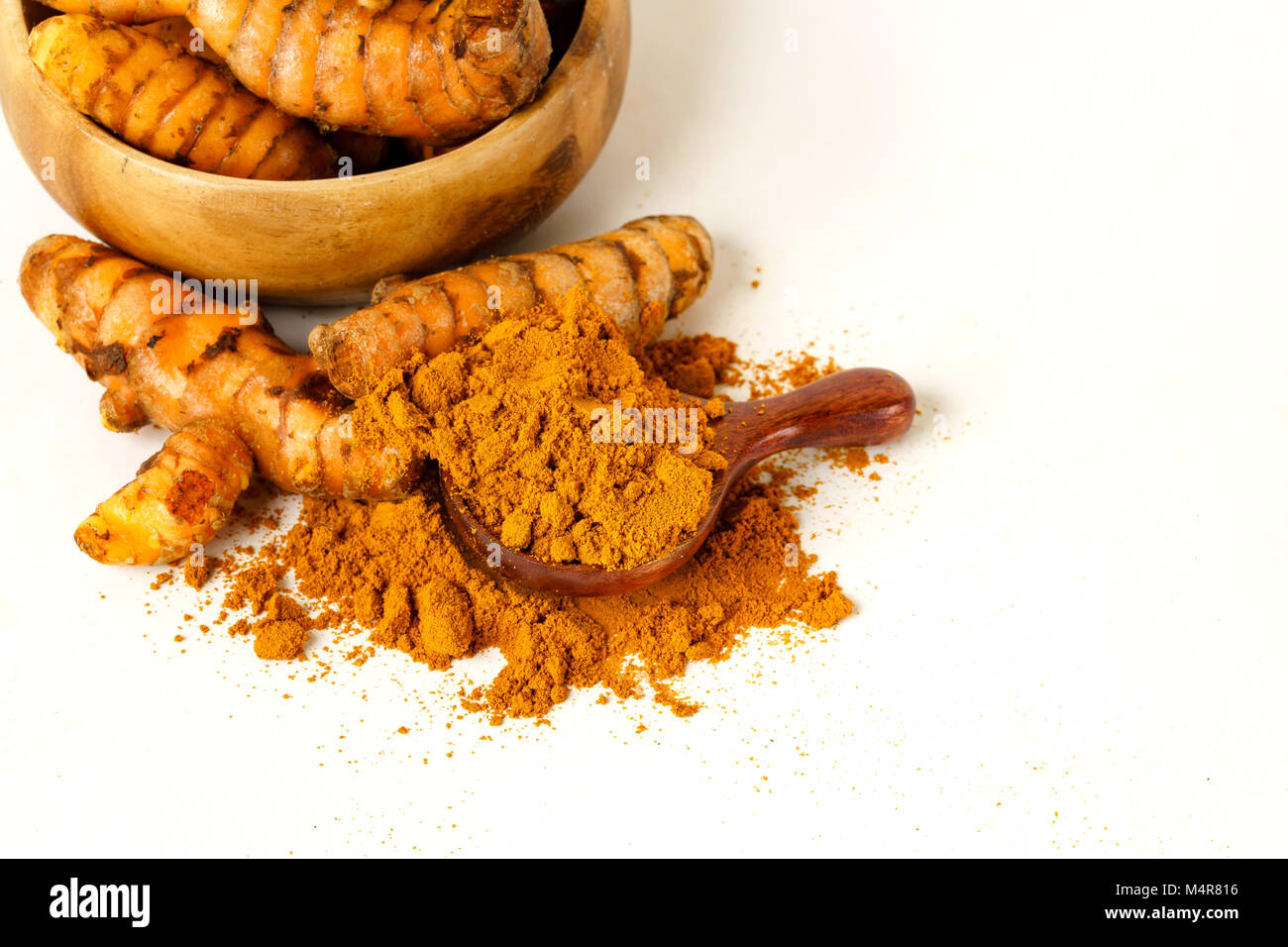 Turmeric whole and powder Stock Photo Alamy