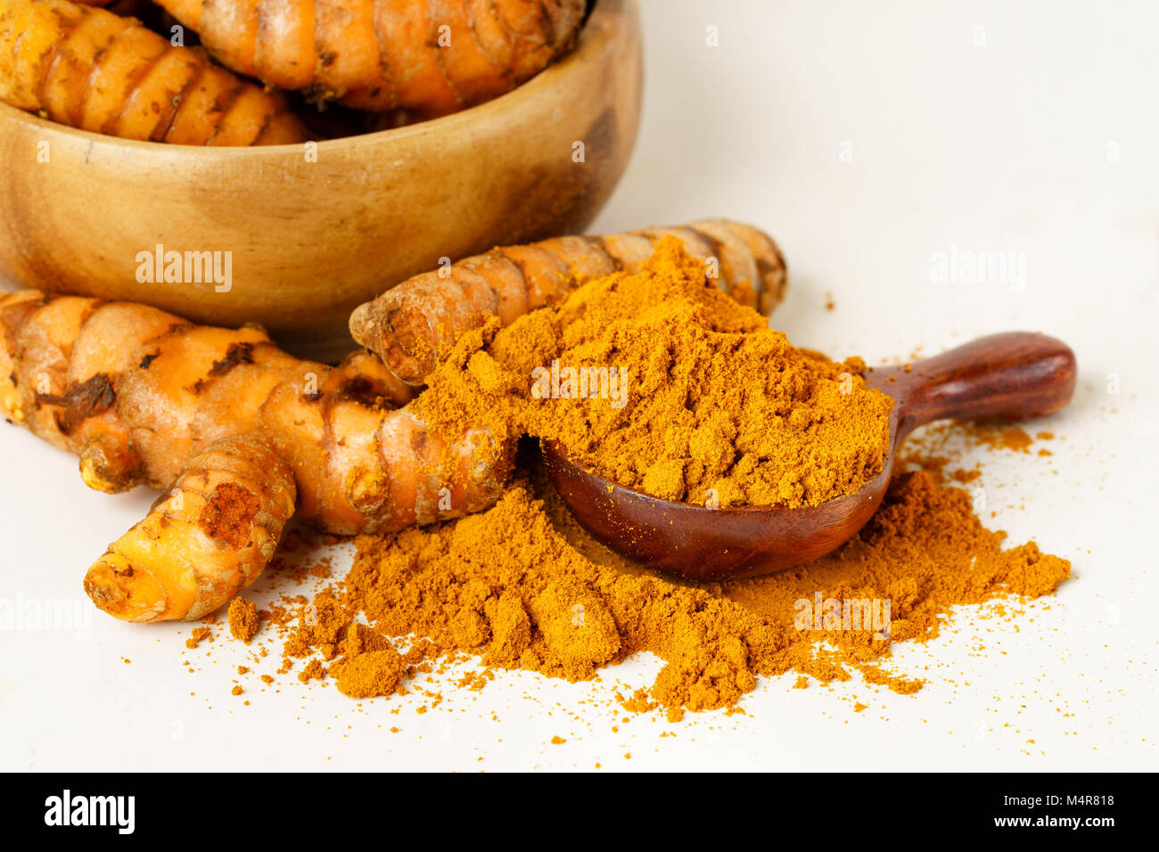 Turmeric whole and powder Stock Photo Alamy
