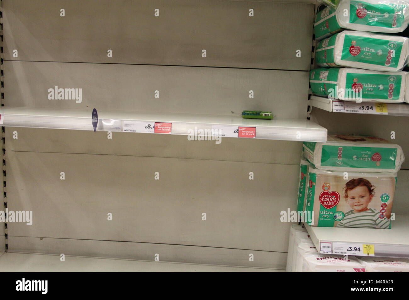 Empty British supermarket shelves. Food shortages. Stock Photo
