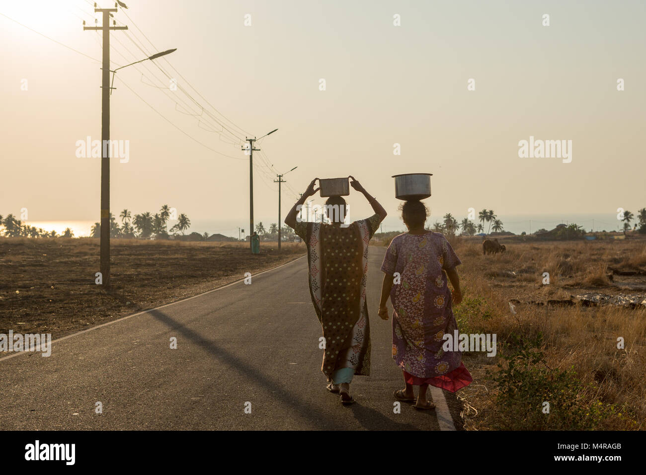Villagers carry water in a remote part of India Stock Photo Alamy