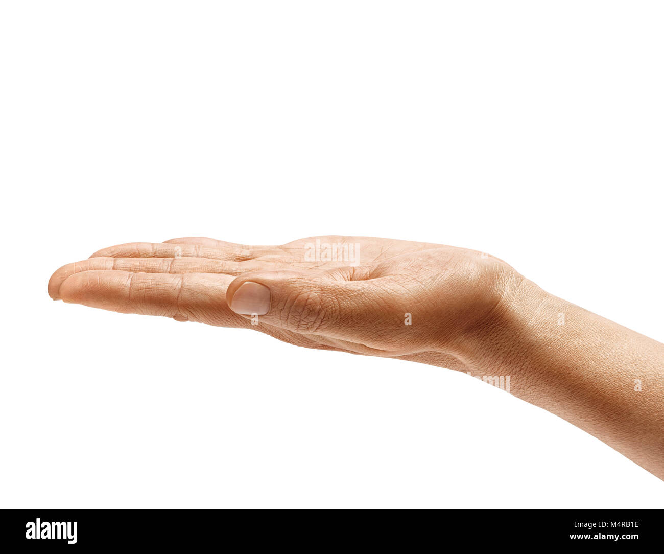Man's hand holding open palm up isolated on white background. Palm up, close up. High resolution product Stock Photo