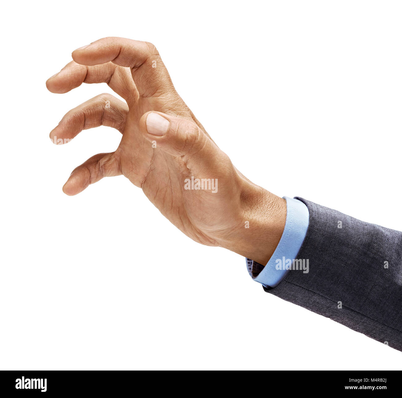 Man's hand in suit grabbing to something isolated on white background. Close up. High resolution product Stock Photo