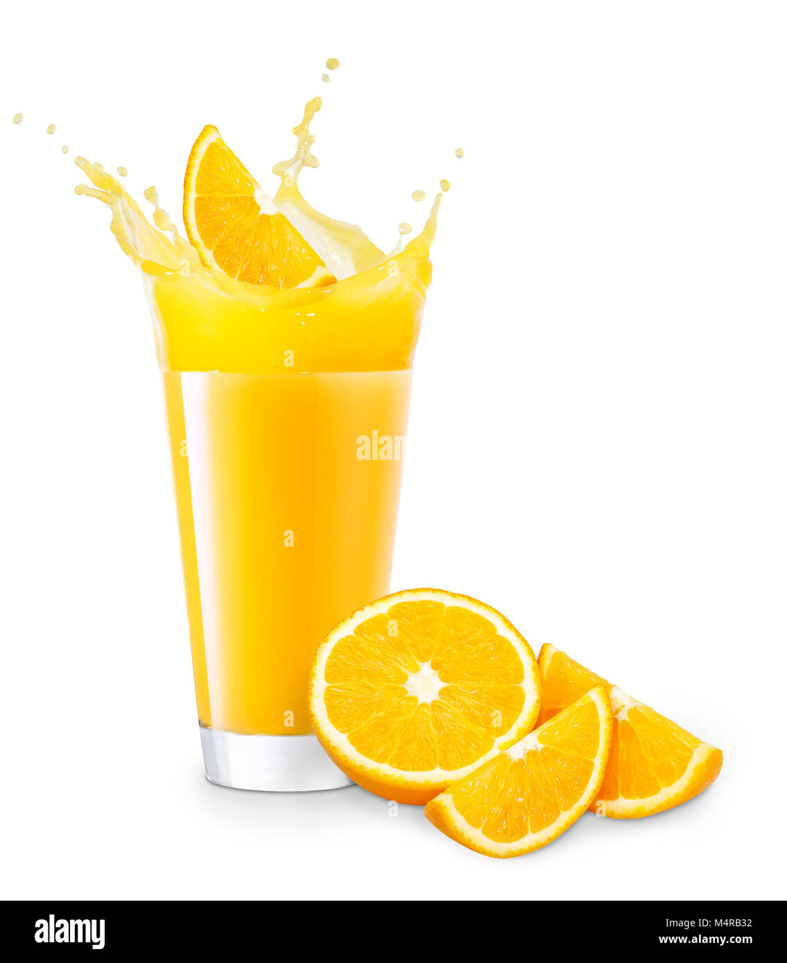 orange slice falling into juice creating splashes. Isolated on white