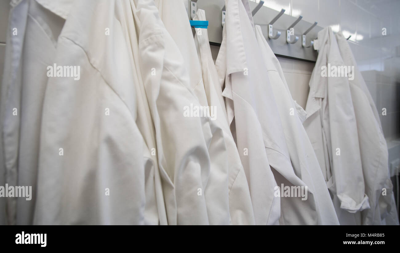Laboratory clothes in changing room Stock Photo Alamy