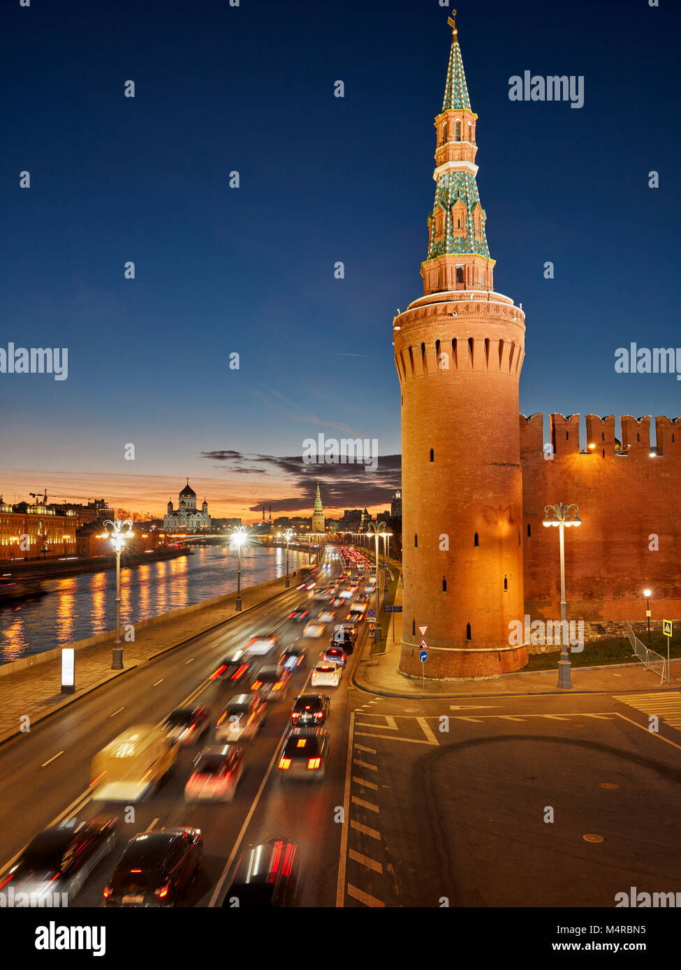 The Beklemishevskaya (Moskvoretskaya) Tower of the Kremlin Wall illuminated at dusk. Moscow, Russia. Stock Photo