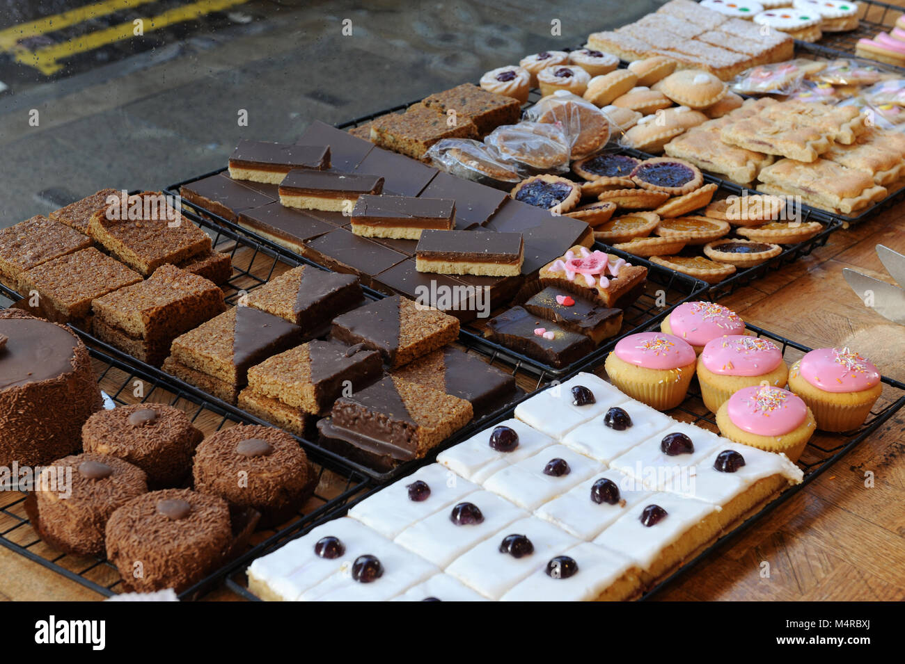 Cakes in Elizabeth Bothams window, Whitby, North Yorkshire, UK Stock Photo