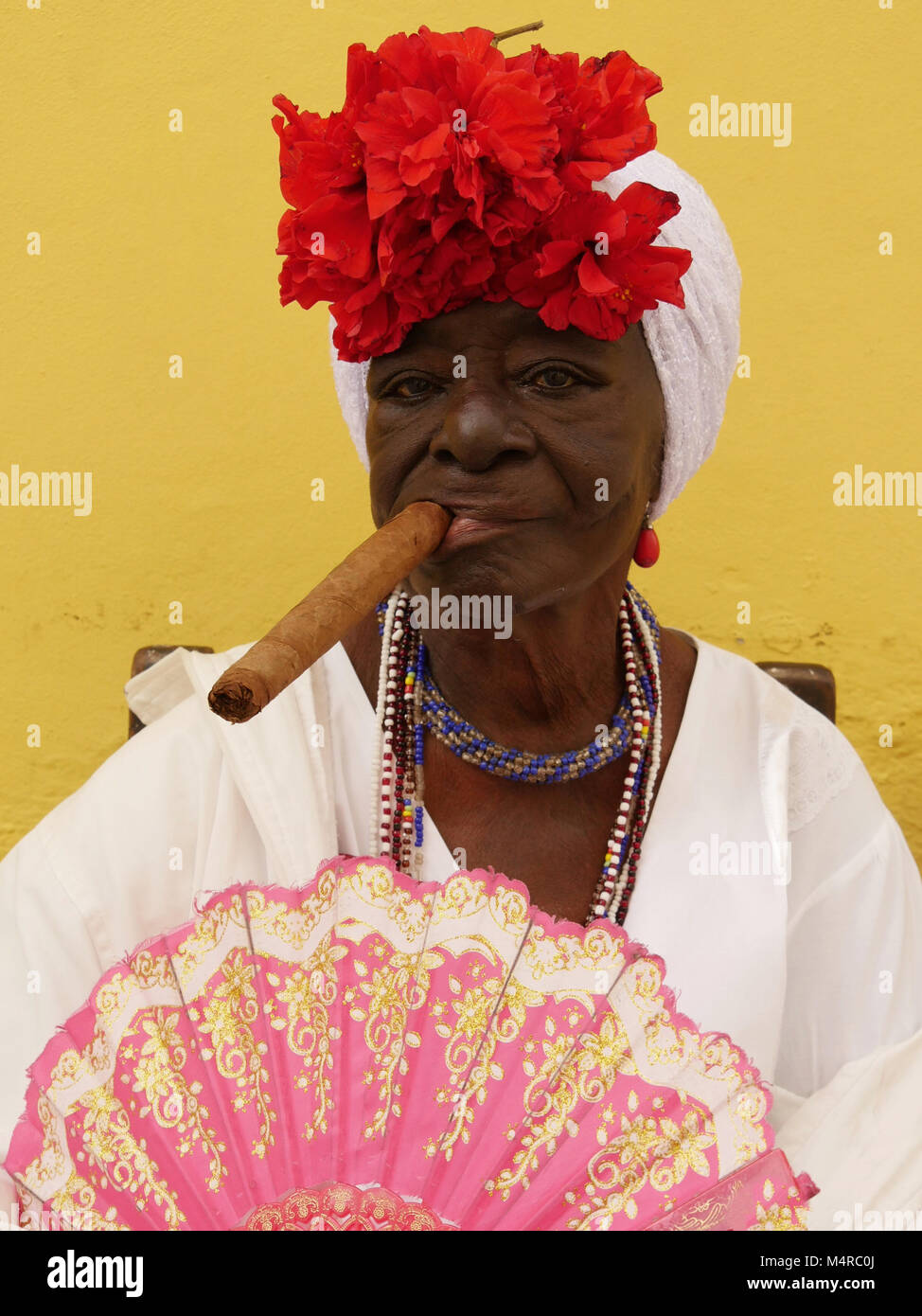 Cuban Woman Smoking Cigar in Havana Stock Photo