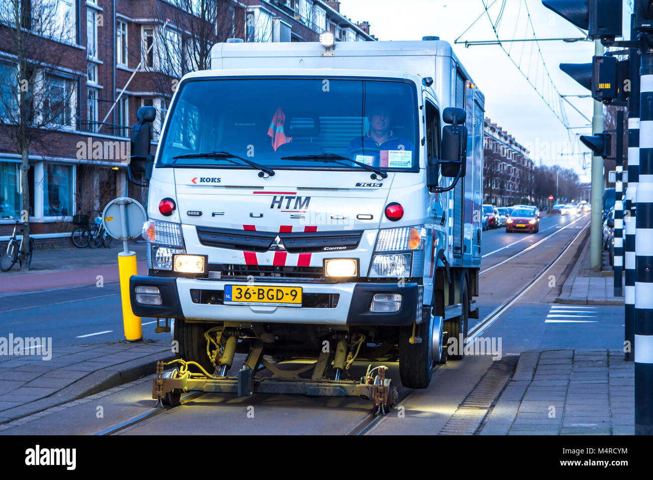 Loosduinen, the Netherlands - 16 February 2018: tram track maintenance vehicle doing rail maintenance on the Randstadrail line Stock Photo
