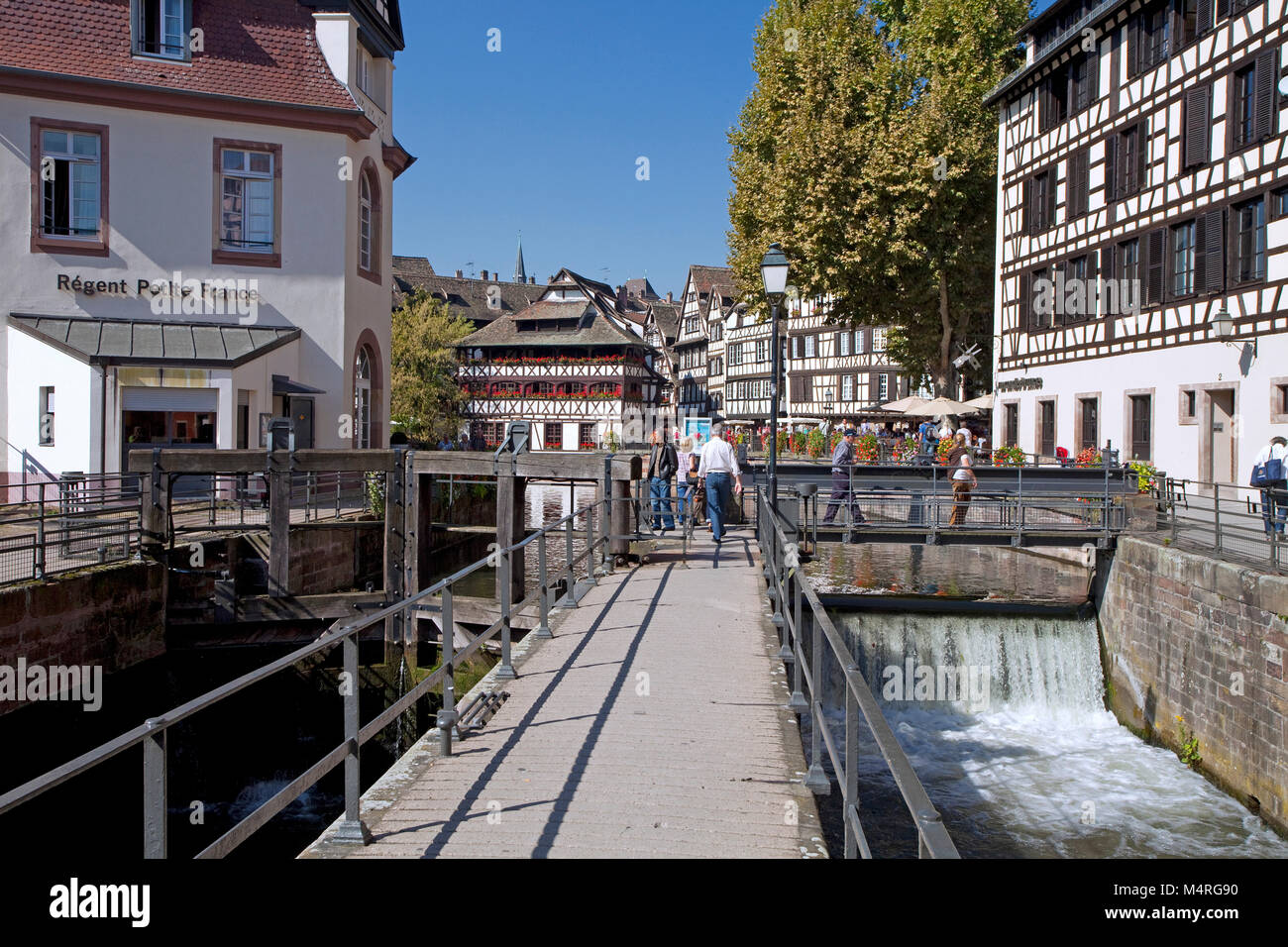 Floodgate at lll river, half-timbered houses, La Petite France (Little France), Strasbourg, Alsace, Bas-Rhin, France, Europe Stock Photo