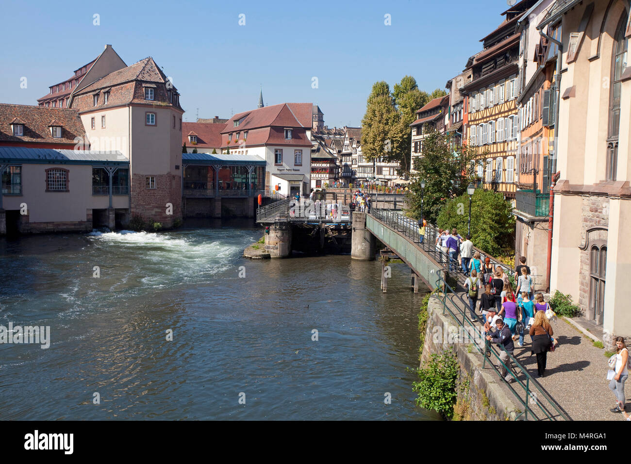 Floodgate at lll river, half-timbered houses, La Petite France (Little France), Strasbourg, Alsace, Bas-Rhin, France, Europe Stock Photo
