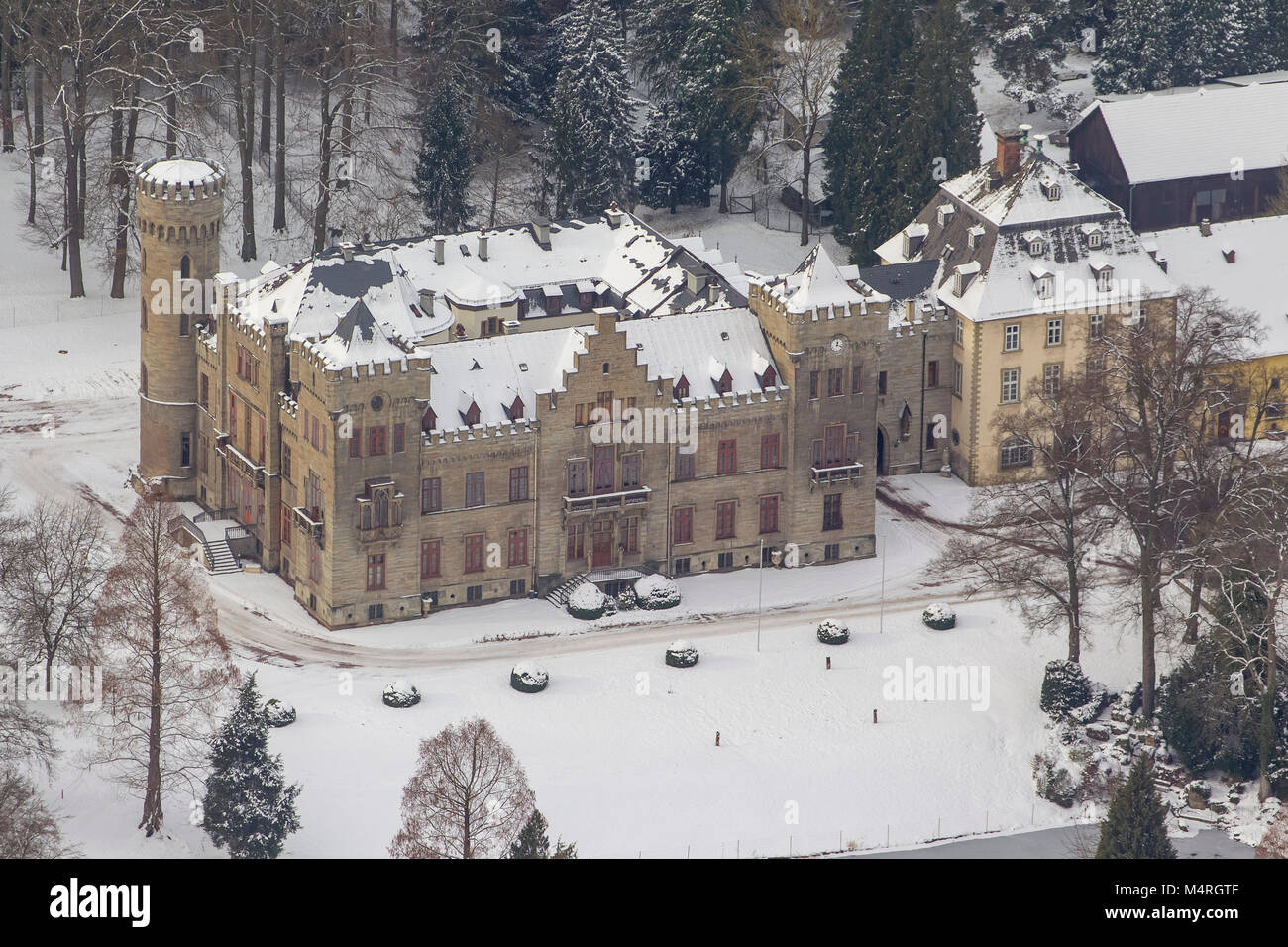 Aerial view, hunting lodge Herdringen Tudor castle in the snow, Neheim
