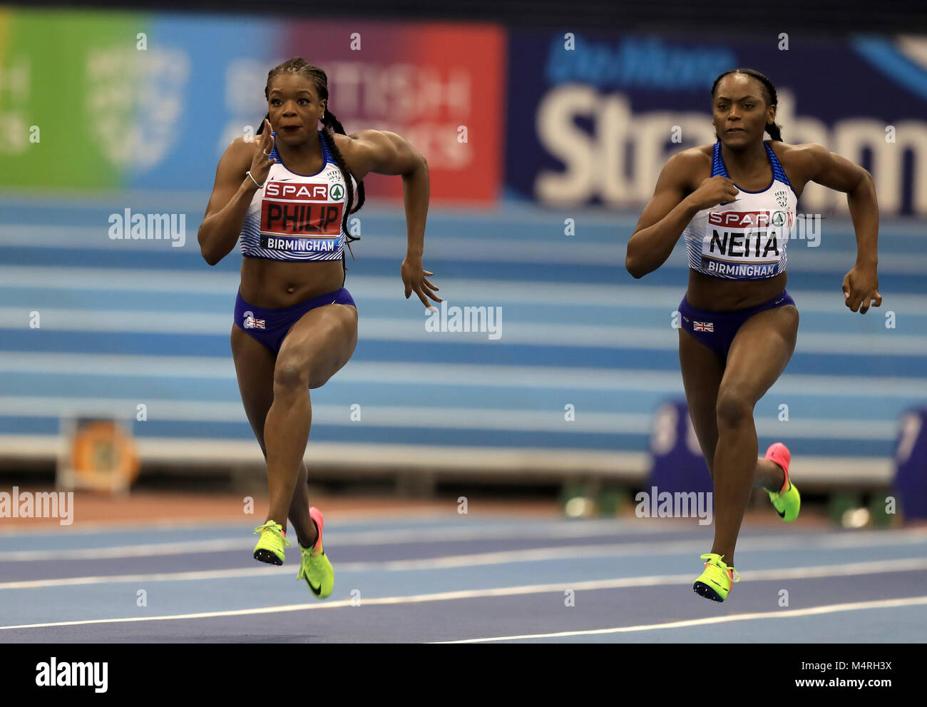 Asha Philip (left) wins the Women's 60m during day one of the SPAR British Indoor Athletics Championships at Arena Birmingham. Stock Photo