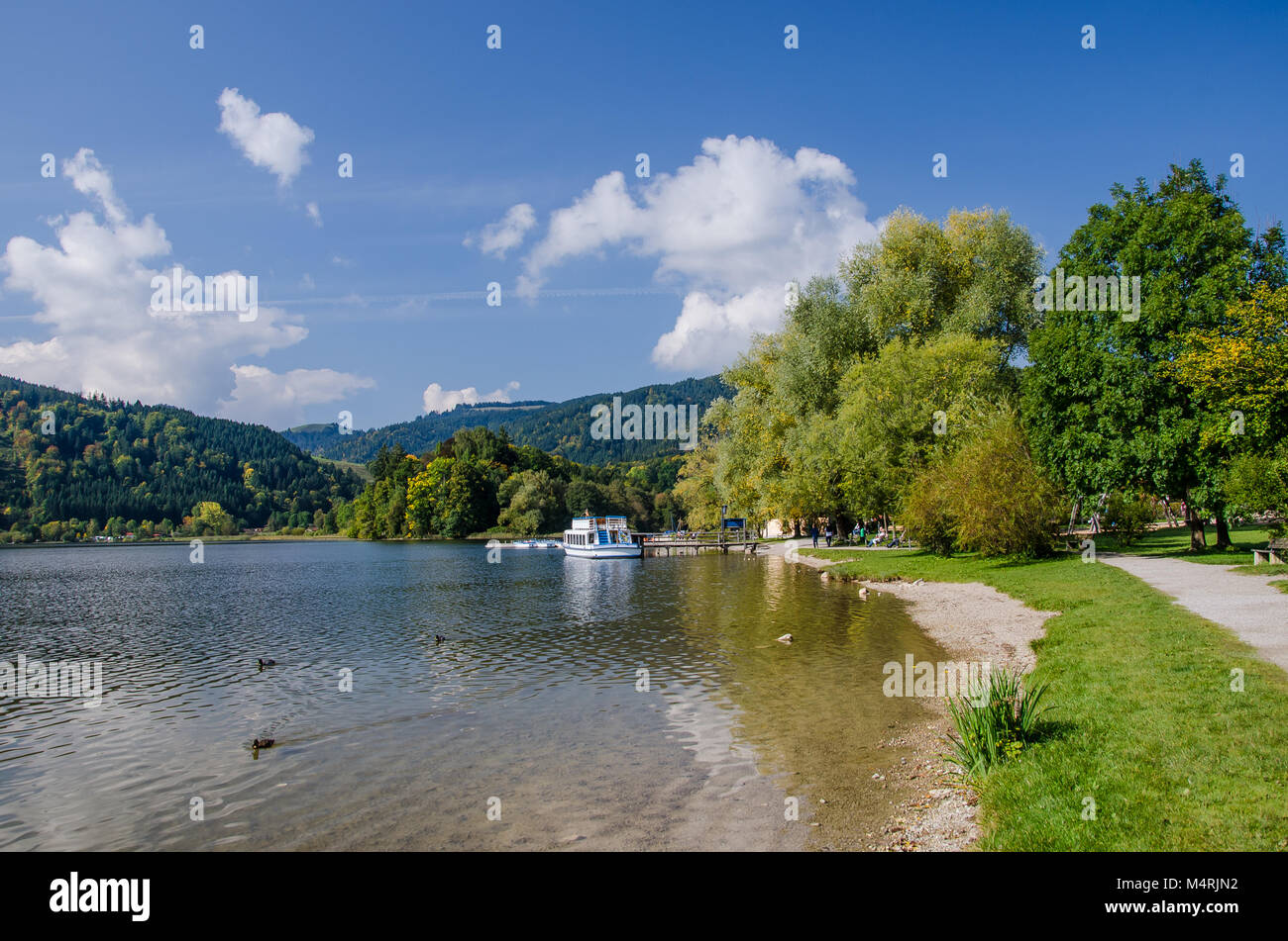 At Schliersee, one can explore the lake from a boat, which is great fun in summer. Stock Photo