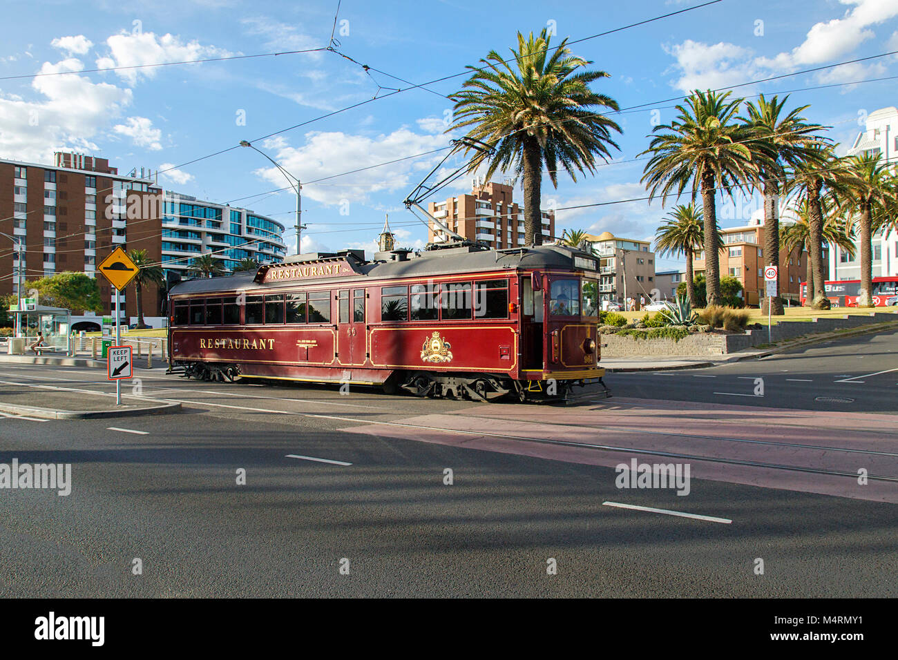 St Kilda, Melbourne, Australia: March 15, 2017: A unique tourist dining experience on a restored, moving restaurant streetcar with vintage decor. Stock Photo