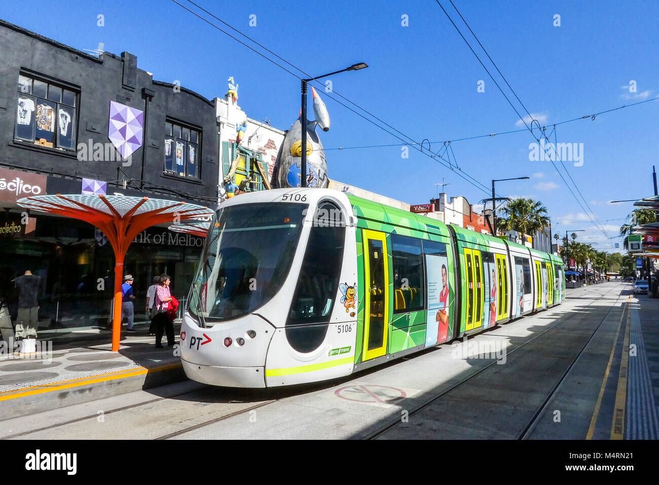 St Kilda, Melbourne, Australia: March 06, 2017: An electric tram arrives at the Acland Street tram stop in St Kilda. Stock Photo