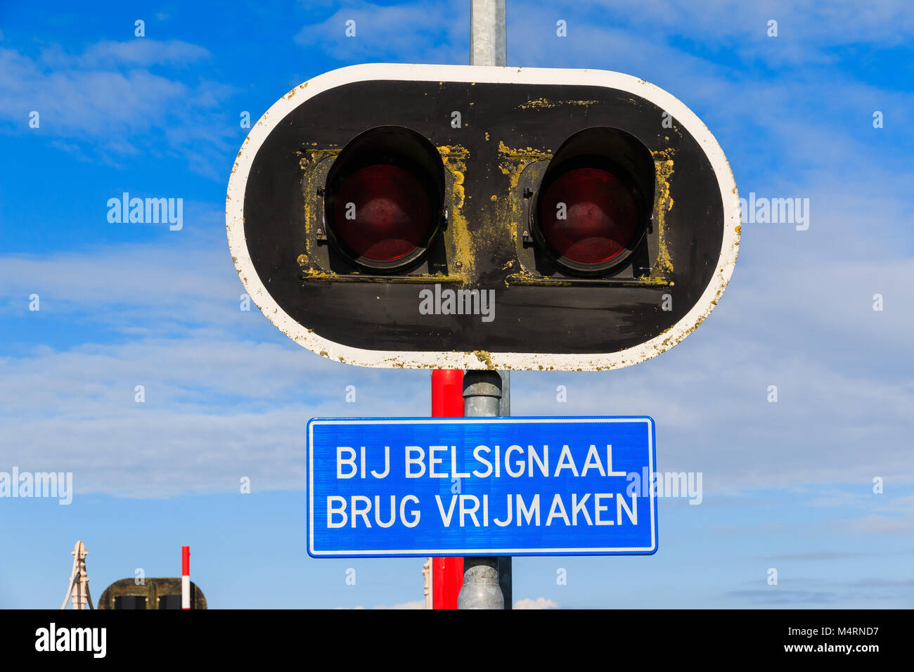 Bycicle bridge warning sign and lights Stock Photo