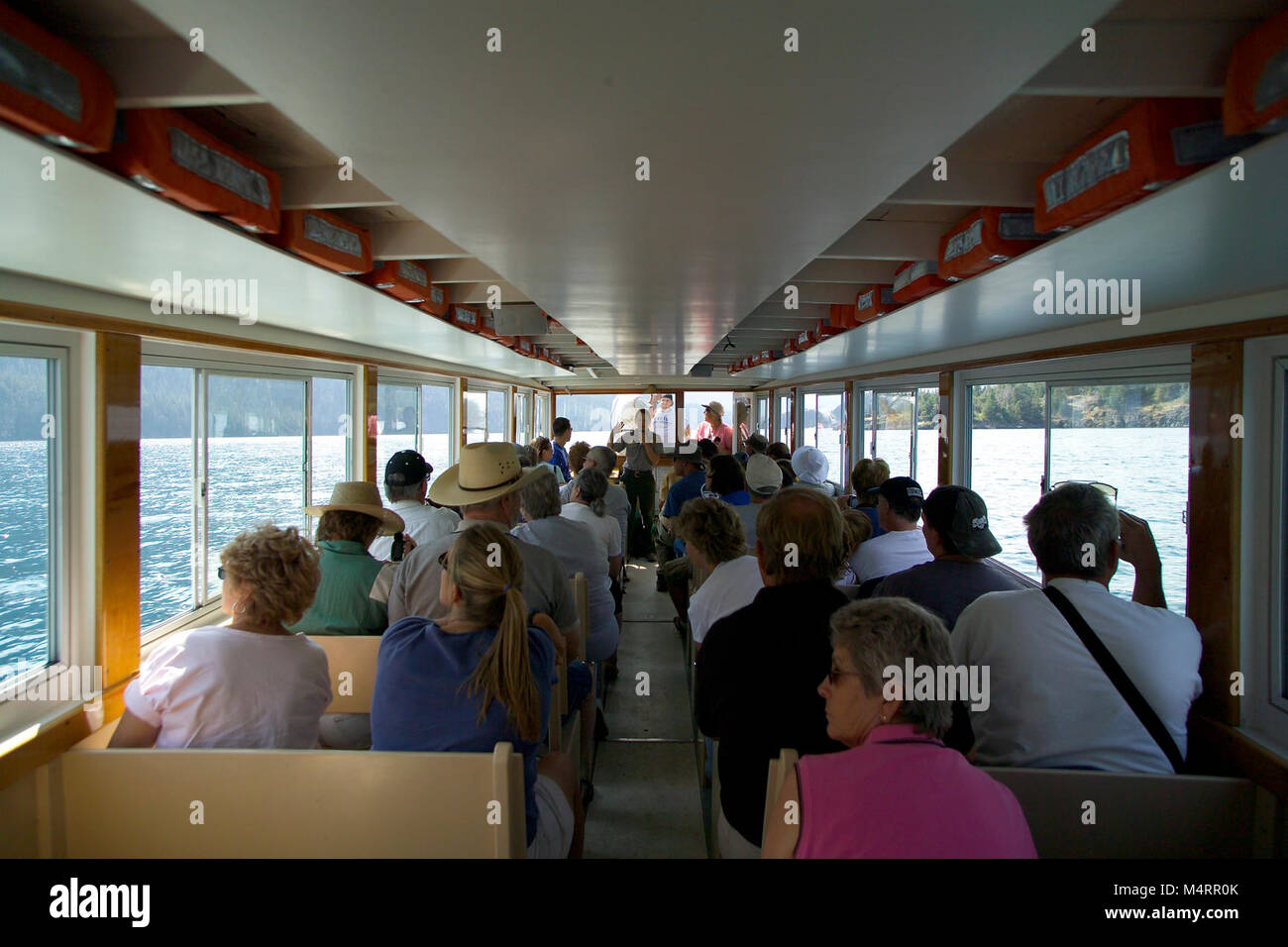 Park Ranger on a Boat Tour in St. Mary..Park Ranger on a Boat Tour. Stock Photo