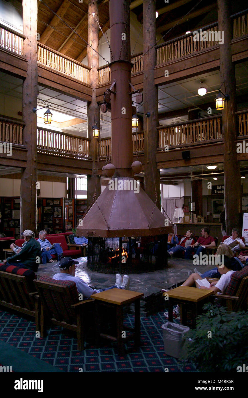 Many Glacier Hotel interior lobby..Many Glacier Hotel Fireplace Stock