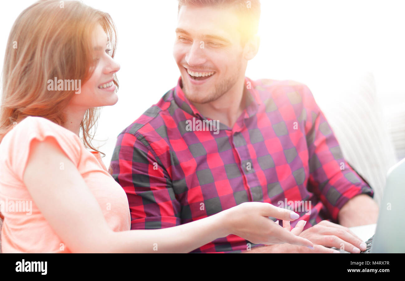 closeup of young couple with laptop Stock Photo - Alamy