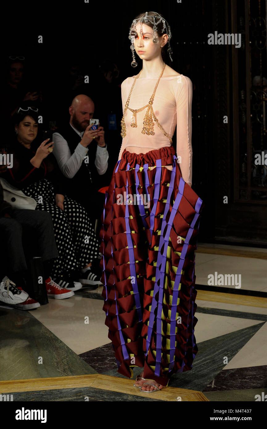 Model on the catwalk at the Susan Fang fashion show at Fashion Scout AW18 at Freemasons Hall, Covent Garden, London, UK. Fashion Scout takes place during London Fashion Week. Susan graduated from Central St. Martins in 2015. 17th February 2018. Credit: Antony Nettle/Alamy Live News Stock Photo