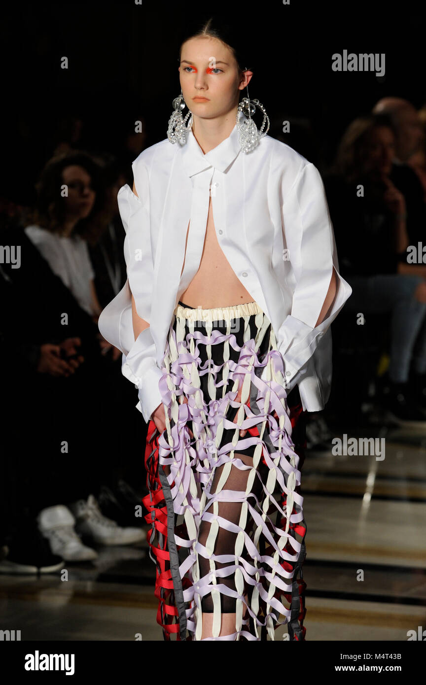 Model on the catwalk at the Susan Fang fashion show at Fashion Scout AW18 at Freemasons Hall, Covent Garden, London, UK. Fashion Scout takes place during London Fashion Week. Susan graduated from Central St. Martins in 2015. 17th February 2018. Credit: Antony Nettle/Alamy Live News Stock Photo