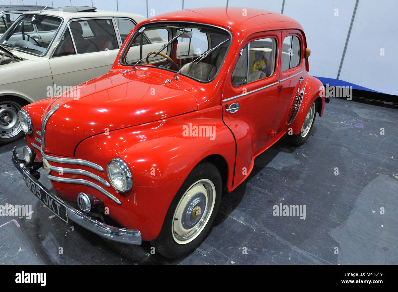 A 1961 Renault 4CV 1.4 on display at the London Classic Car Show which is taking place at ExCel London, United Kingdom.  More than 700 of the world's finest classic cars are on display at the show ranging from vintage pre-war tourers to a modern concept cars. The show brings in around 37,000 visitors, ranging from serious petrol hea ds to people who just love beautiful and classic vehicles. Credit: Michael Preston/Alamy Live News Stock Photo