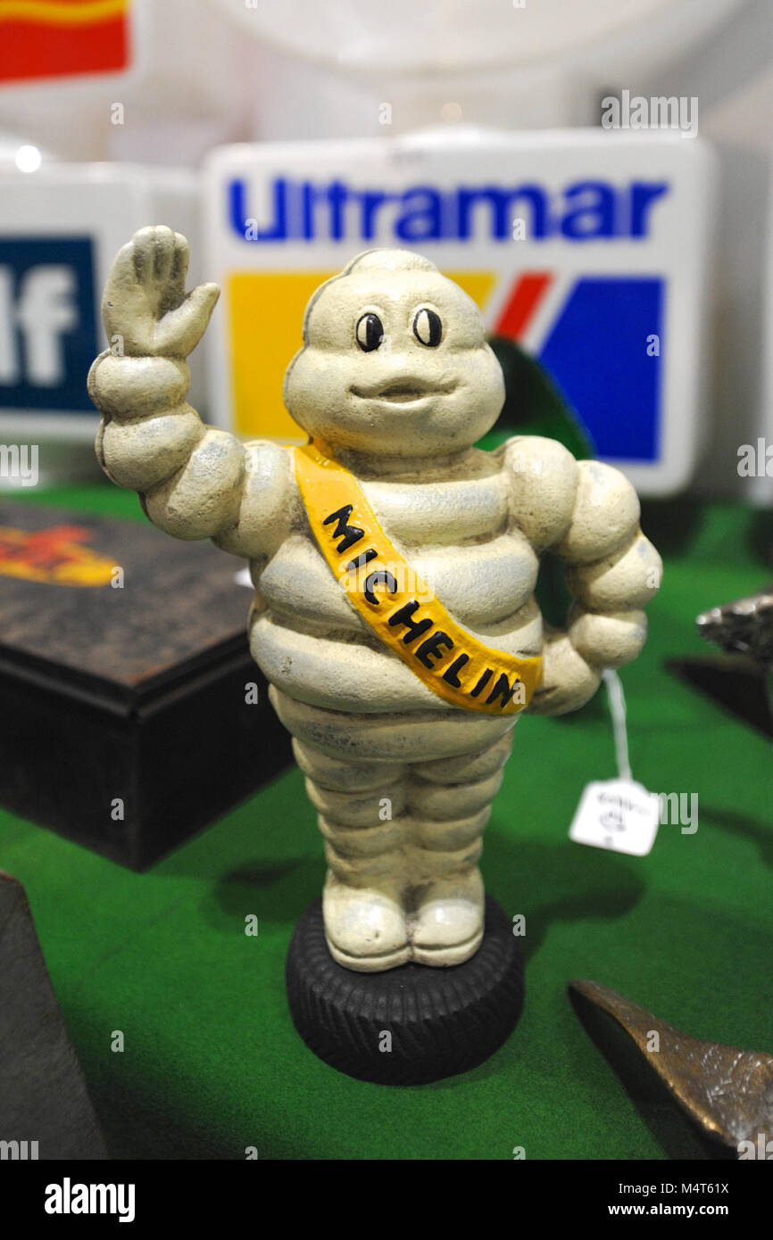 A vintage Michelin Man figurine on display at the London Classic Car Show  which is taking place at ExCel London, United Kingdom. A wide variety of  vintage petroliana and automobilia items are