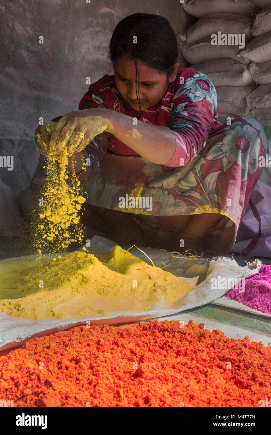 Kolkata, India. 17th Feb, 2018. An Indian woman prepares gulal or colored powder, which will be used for the upcoming Holi Festival, at Uttar Chara village, some 110 km away from Kolkata, India, on Feb. 17, 2018. Holi Festival, also known as Spring Festival of Colors, usually falls in the later part of February or March, and it is celebrated by Hindu residents around the world by throwing gulal at each other. Credit: Tumpa Mondal/Xinhua/Alamy Live News Stock Photo