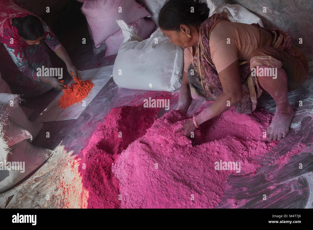 Kolkata, India. 17th Feb, 2018. Indian women prepare gulal or colored powder, which will be used for the upcoming Holi Festival, at Uttar Chara village, some 110 km away from Kolkata, India, on Feb. 17, 2018. Holi Festival, also known as Spring Festival of Colors, usually falls in the later part of February or March, and it is celebrated by Hindu residents around the world by throwing gulal at each other. Credit: Tumpa Mondal/Xinhua/Alamy Live News Stock Photo