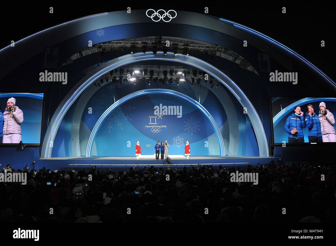 Womens skeleton. The medalists are led onto the stage. Medal ceremonies. Pyeongchang Olympic Plaza. Pyeongchang2018 winter Olympics. Alpensia. Republic of Korea. 18/02/2018. Credit: Sport In Pictures/Alamy Live News Stock Photo