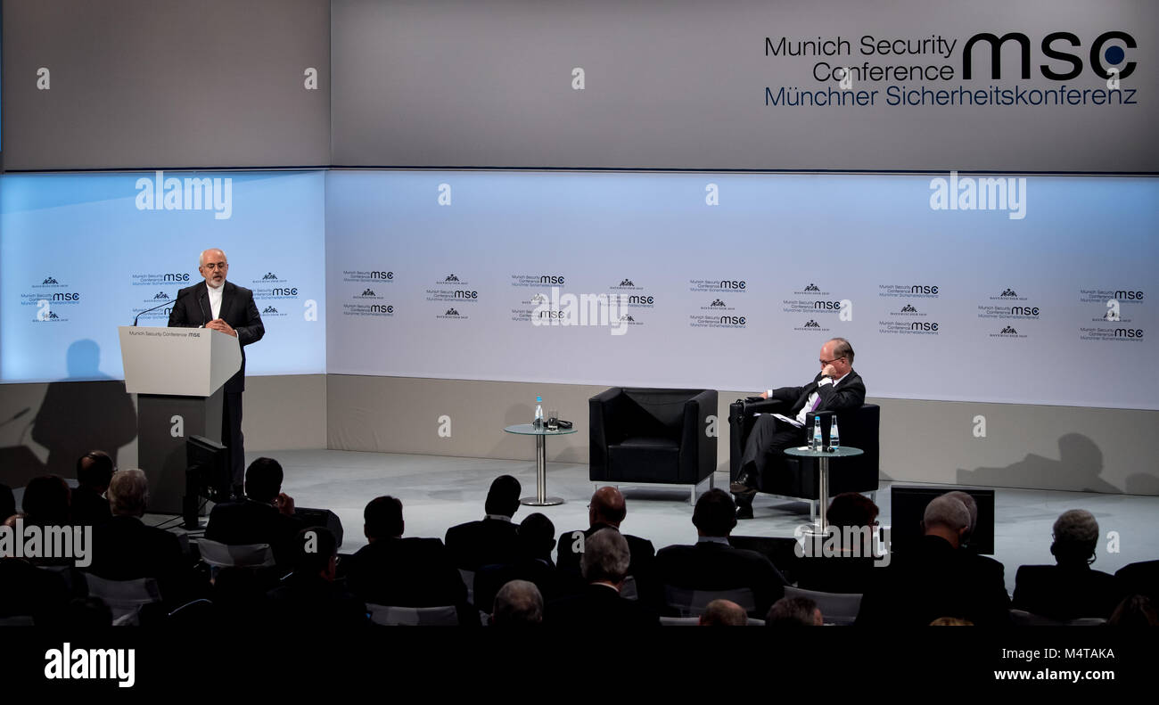 18 February 2018, Munich, Germany: Mohammad Javad Zarif, foreign minister of Iran, speaks during the 54th Munich Security Conference. To his right the chairman of the Munich Security Conference, Wolfgang Ischinger, is seated. The three day conference will host more than 500 guests, among them heads of states and government leaders. Photo: Sven Hoppe/dpa Credit: dpa picture alliance/Alamy Live News Stock Photo