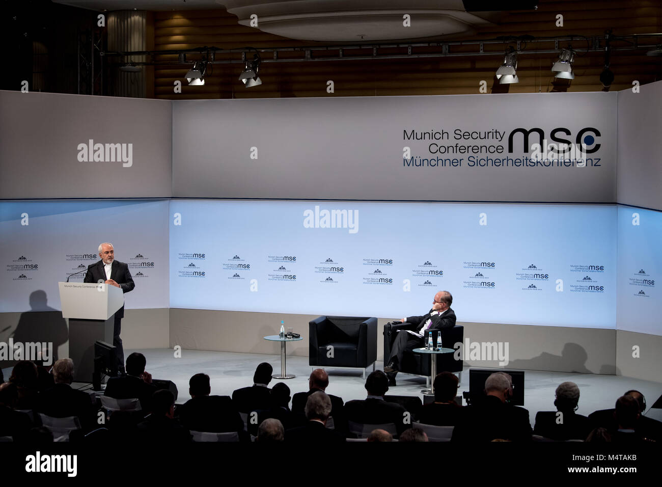 18 February 2018, Munich, Germany: Mohammad Javad Zarif, foreign minister of Iran, speaks during the 54th Munich Security Conference. To his right the chairman of the Munich Security Conference, Wolfgang Ischinger, is seated. The three day conference will host more than 500 guests, among them heads of states and government leaders. Photo: Sven Hoppe/dpa Credit: dpa picture alliance/Alamy Live News Stock Photo