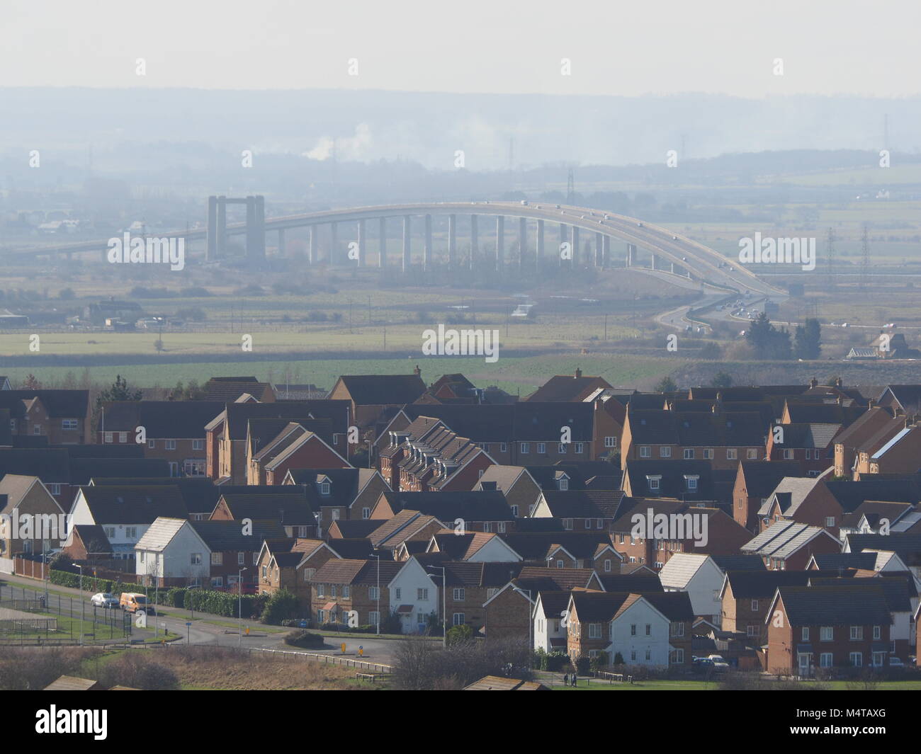 Minster on sea, Kent, UK. 18th Feb, 2018. UK Weather: another sunny and warm day in Minster on sea on the Isle of Sheppey in north Kent. The Sheppey Crossing. Temp: 10c. Credit: James Bell/Alamy Live News Stock Photo