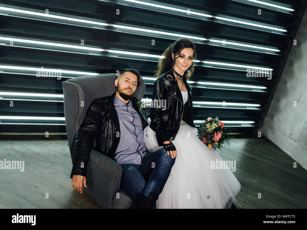 Wedding in the style of rock. Rocker or Biker wedding. Guys with ...