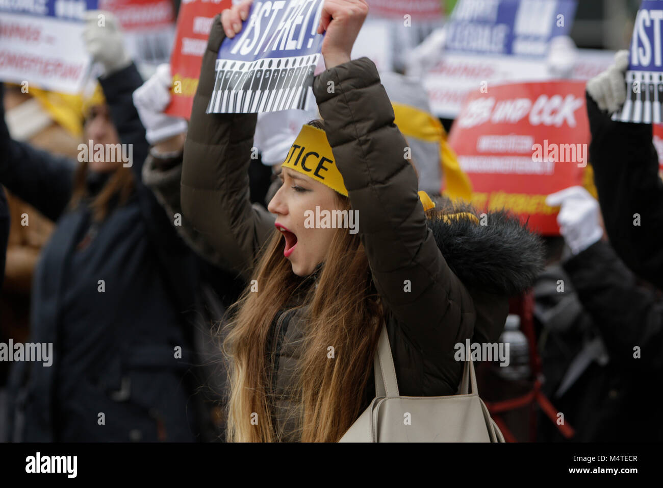 Frankfurt, Germany. 17th Feb, 2018. A sympathiser of the Human Rights Association for Forced Conversion shouts at the rally. Sympathisers of the Human Rights Association for Forced (HRAFC) protested in Frankfurt against the alleged forced conversion by Christian pastors, mostly associated with the Christian Council of Korea (CCK), in South Korea. They wanted to highlight the issue and call for a punishment of the perpetrators. Credit: Michael Debets/Pacific Press/Alamy Live News Stock Photo