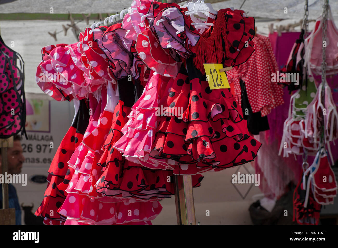 child's flamenco dresses Spanish steet market Stock Photo