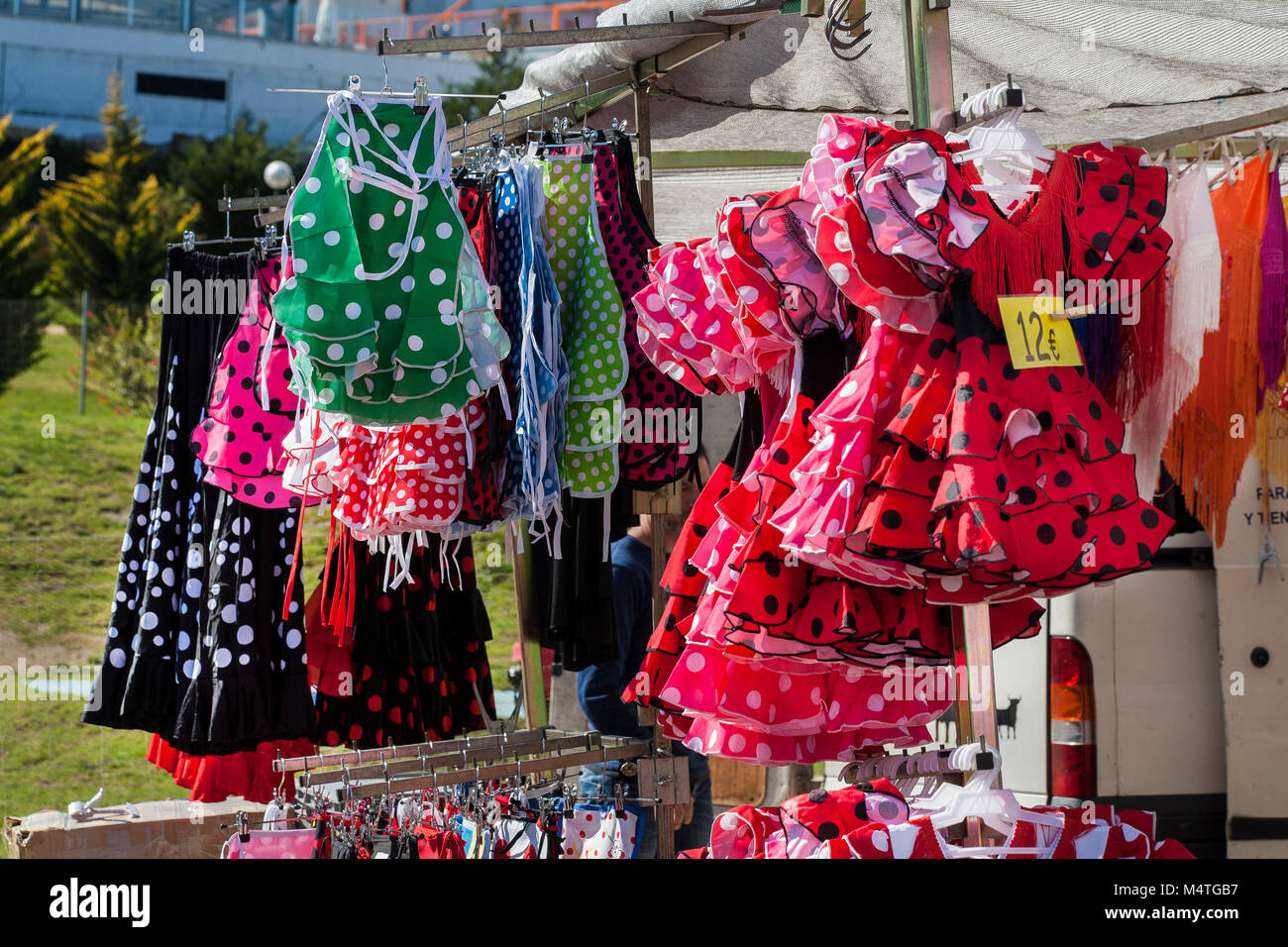 child's flamenco dresses Spanish steet market Stock Photo