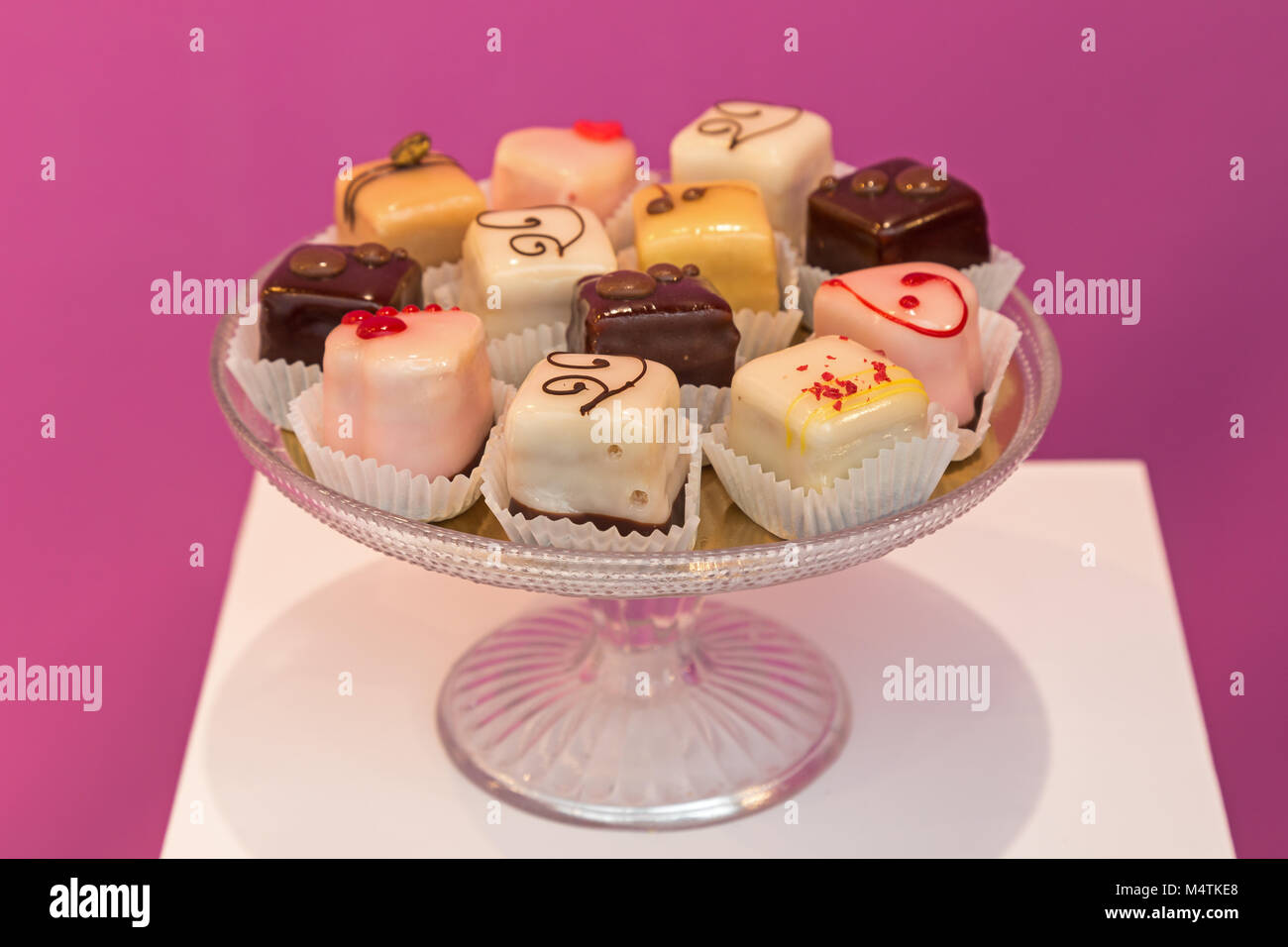 Chocolates in a glass bowl Stock Photo Alamy