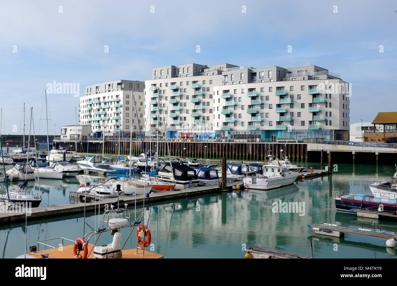 Brighton Marina UK February 2018 - Newly built flats homes and retail outlets plus restaurants overlooking the marina Stock Photo